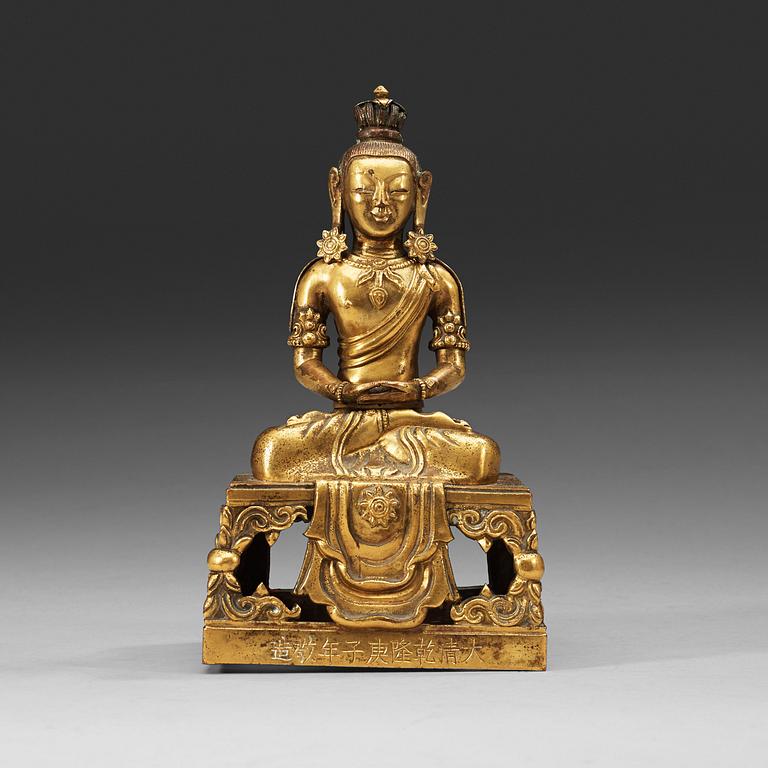 A gilt bronze figure of Amitayus, Qing dynasty with Qianlong mark and period, dating corresponding to 1780.