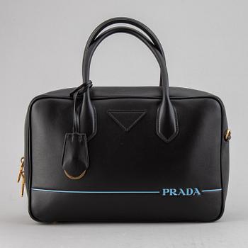 PRADA, a leather bag.