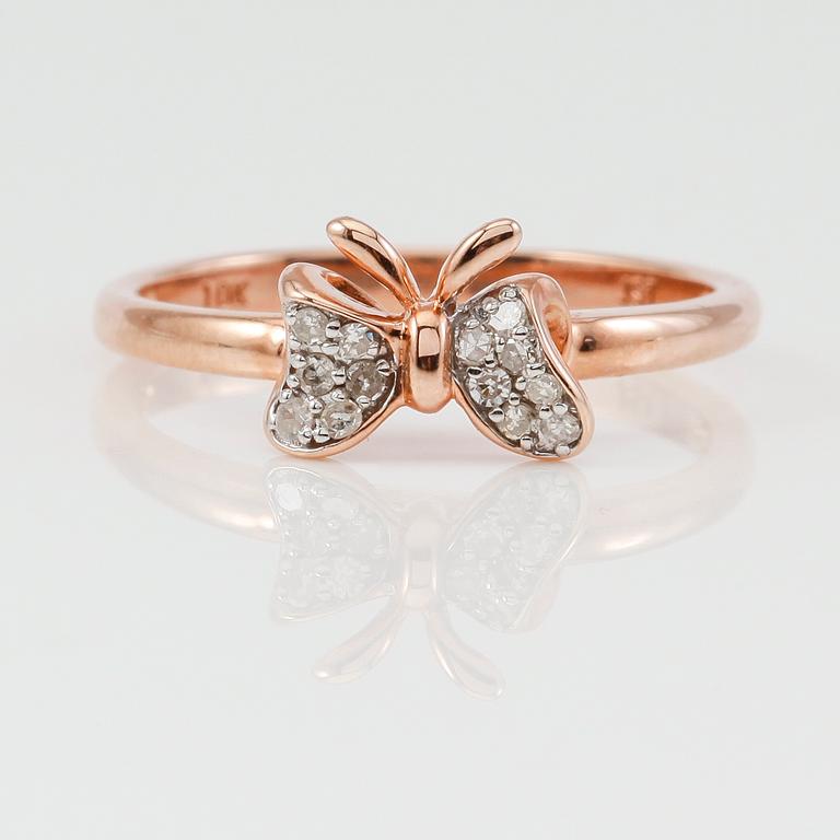 RING, 10K roséguld och diamanter tot ca 0.10 ct.