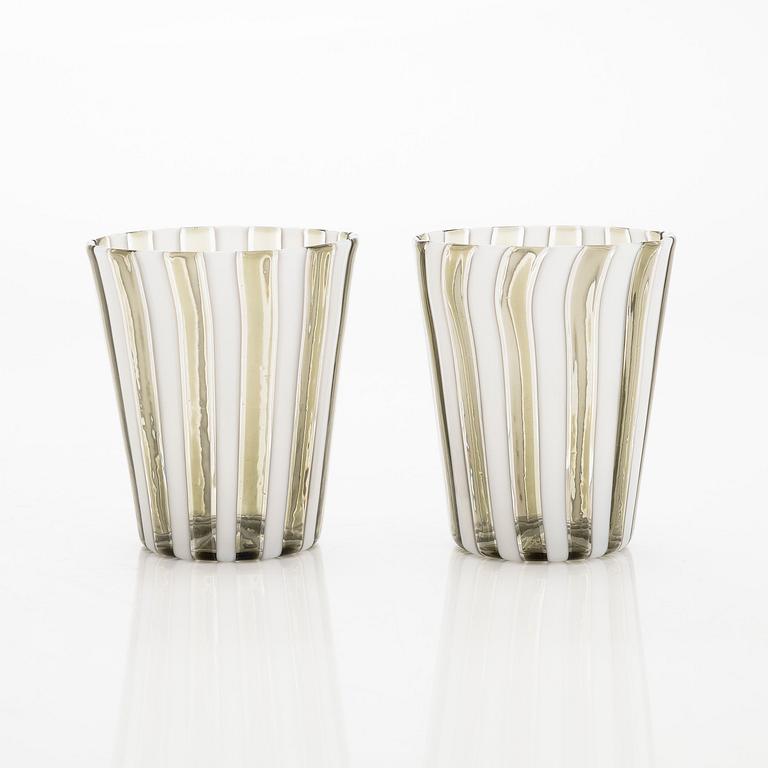 Gio Ponti, a glass bottle '4500' signed Venini, Murano and three drinking glasses, Italy.