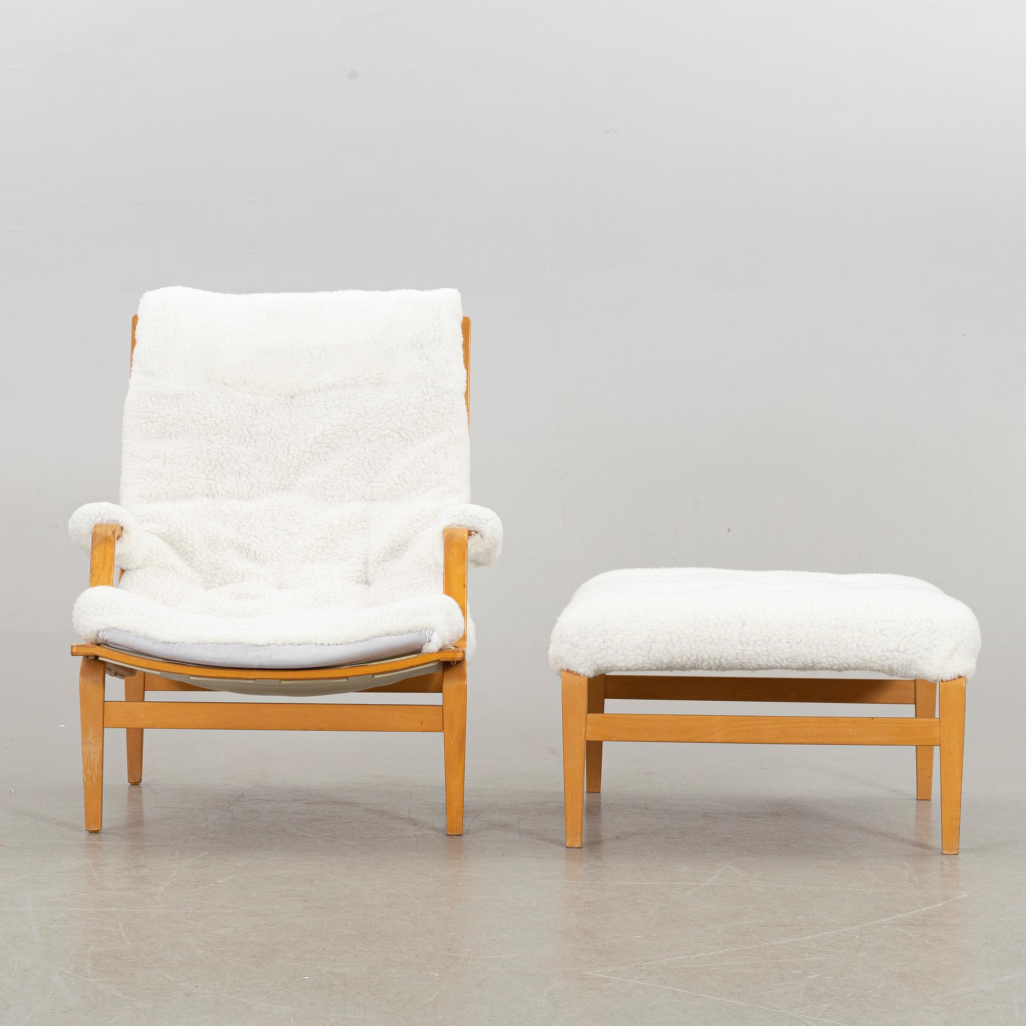BRUNO MATHSSON, an "ingrid" armchair and stool for Dux. Late 20th century.