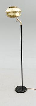 An Alvar Aalto 'A 808' brass and black leather floor lamp, Valaisinpaja, Finland late 1970's.