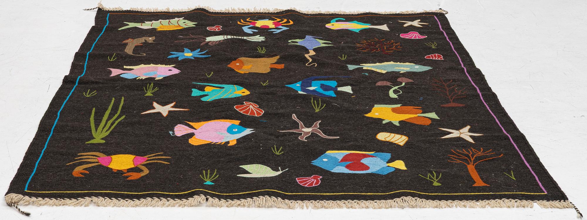 A hand-embroidered Kelim rug, c. 225 x 177 cm.