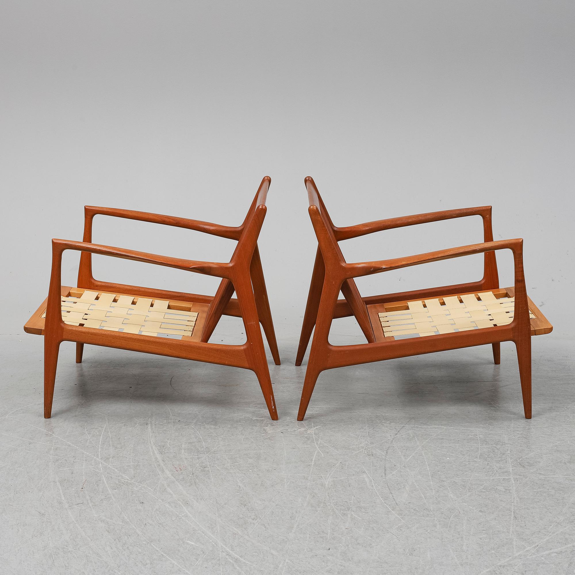 A pair of late 20th Century easy chairs.