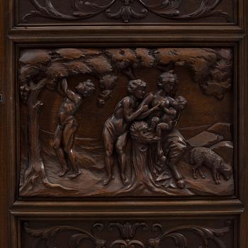 A circa 1900 oak cabinet.