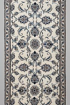 A runner carpet, Nain, part silk, ca 248 x 72 cm.
