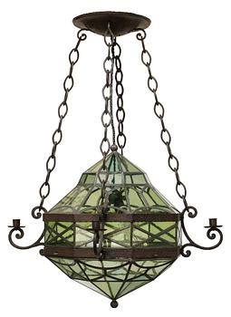 710. AN ART NOVEAU hammered iron hanging lamp with leaded glass panes, Sweden ca 1910.