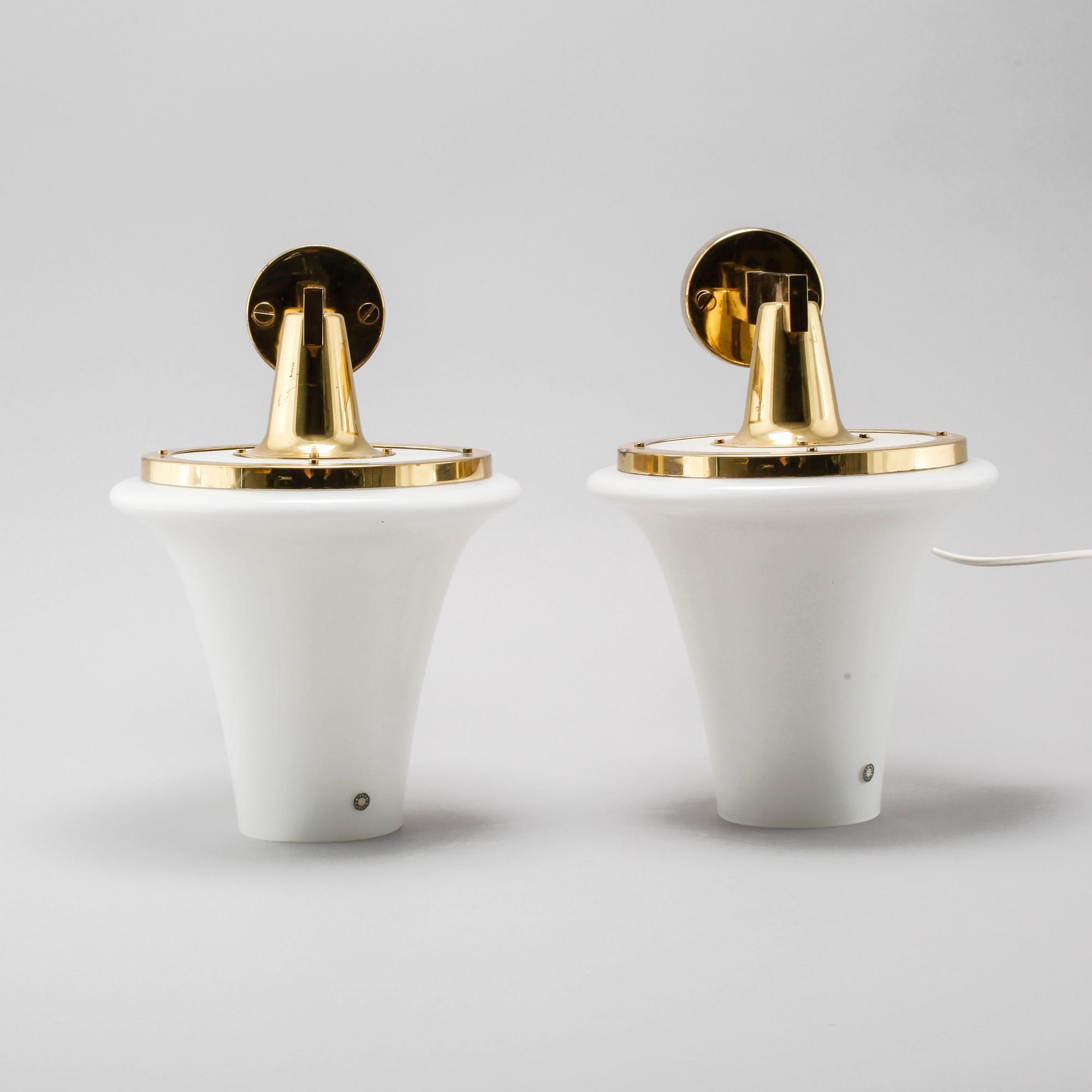 A pair of wall lamps designed by Hans-Agne Jakobsson, Markaryd, from the fourth quarter of the 20th century.