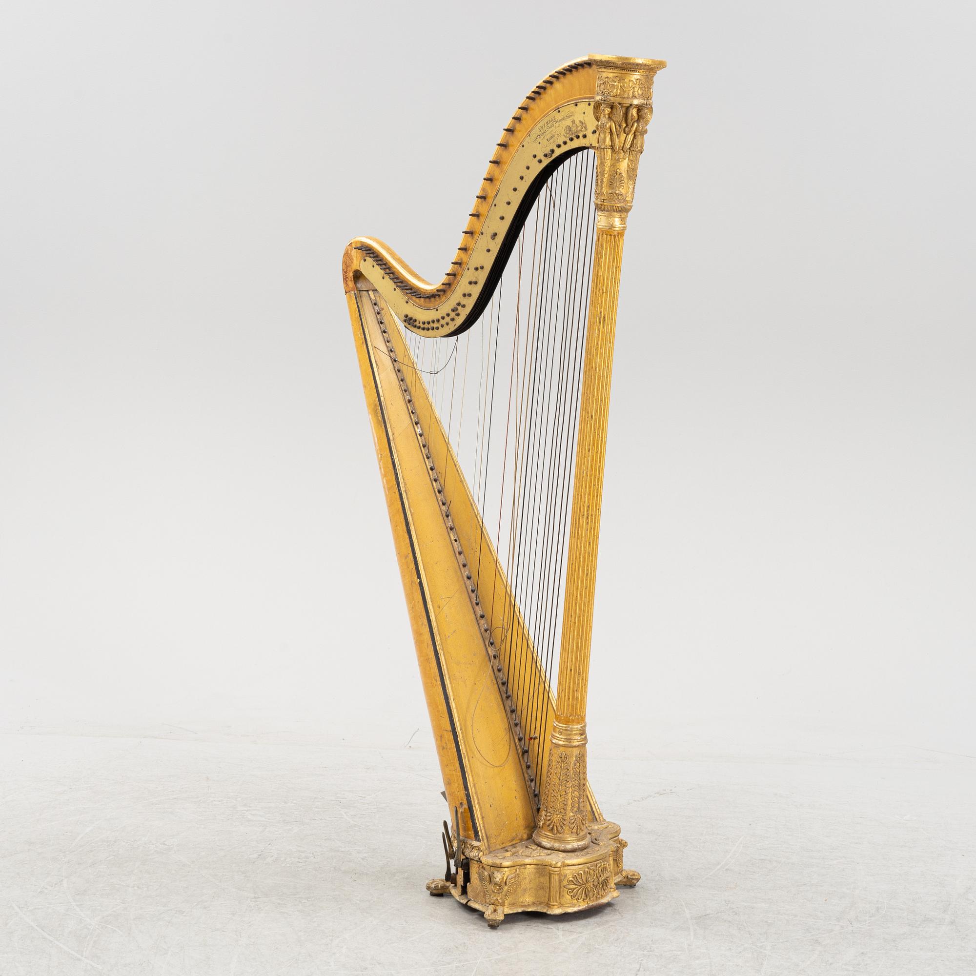 A pedal harp by Jacob & James Erat, London, No 1610, probably made between 1825-1830.