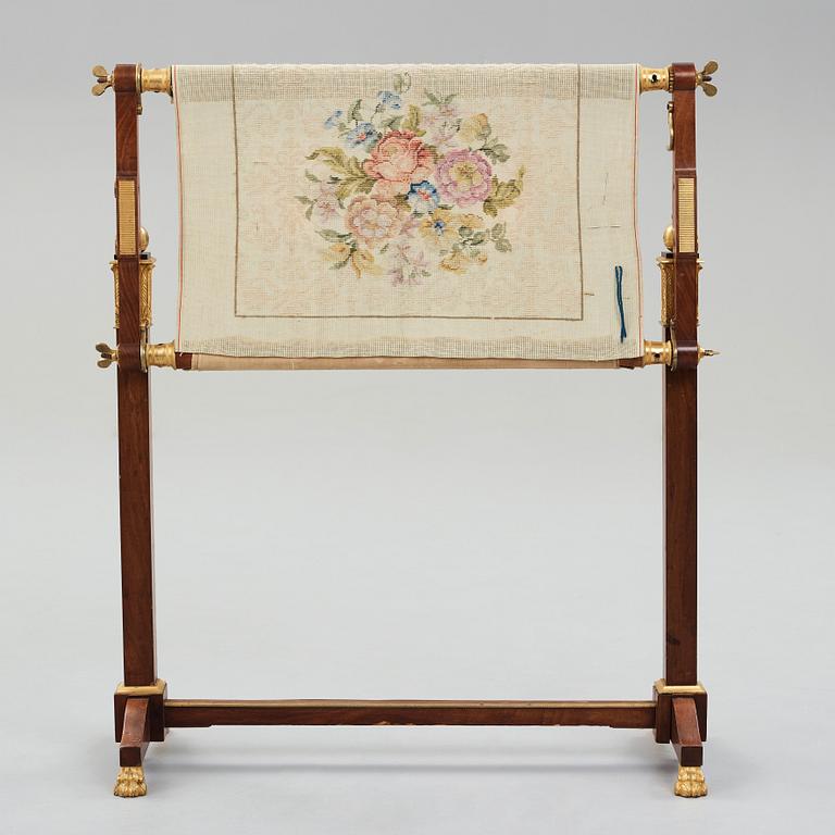 A French Empire early 19th century sewing stand.