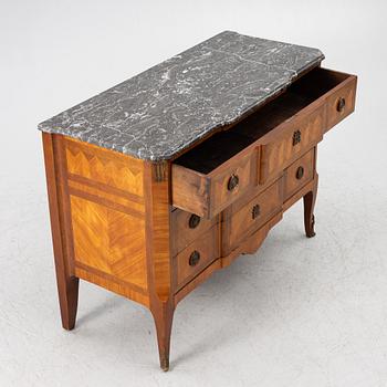 A Louis XVI style chest of drawers, France, circa 1900.