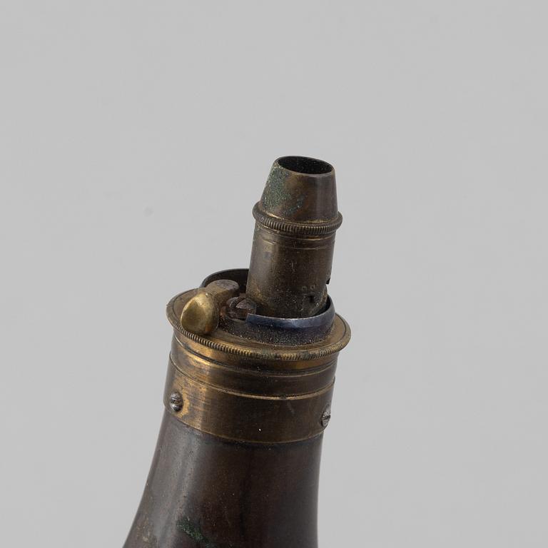 Gunpowder horn and three powder flasks, 19th century.