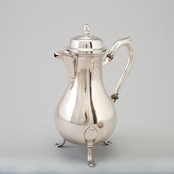 A three-piece silver coffee service from Borel & Co, Germany, mid 20th Century.