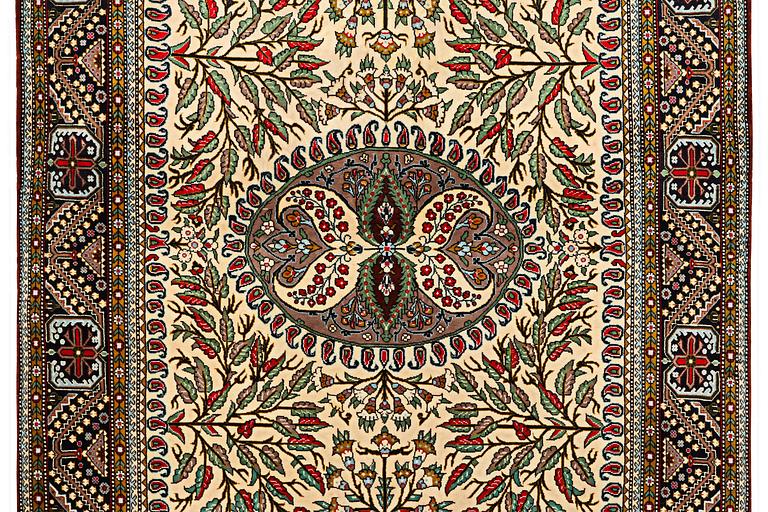 A rug, Sarouk, c. 220 x 144 cm.