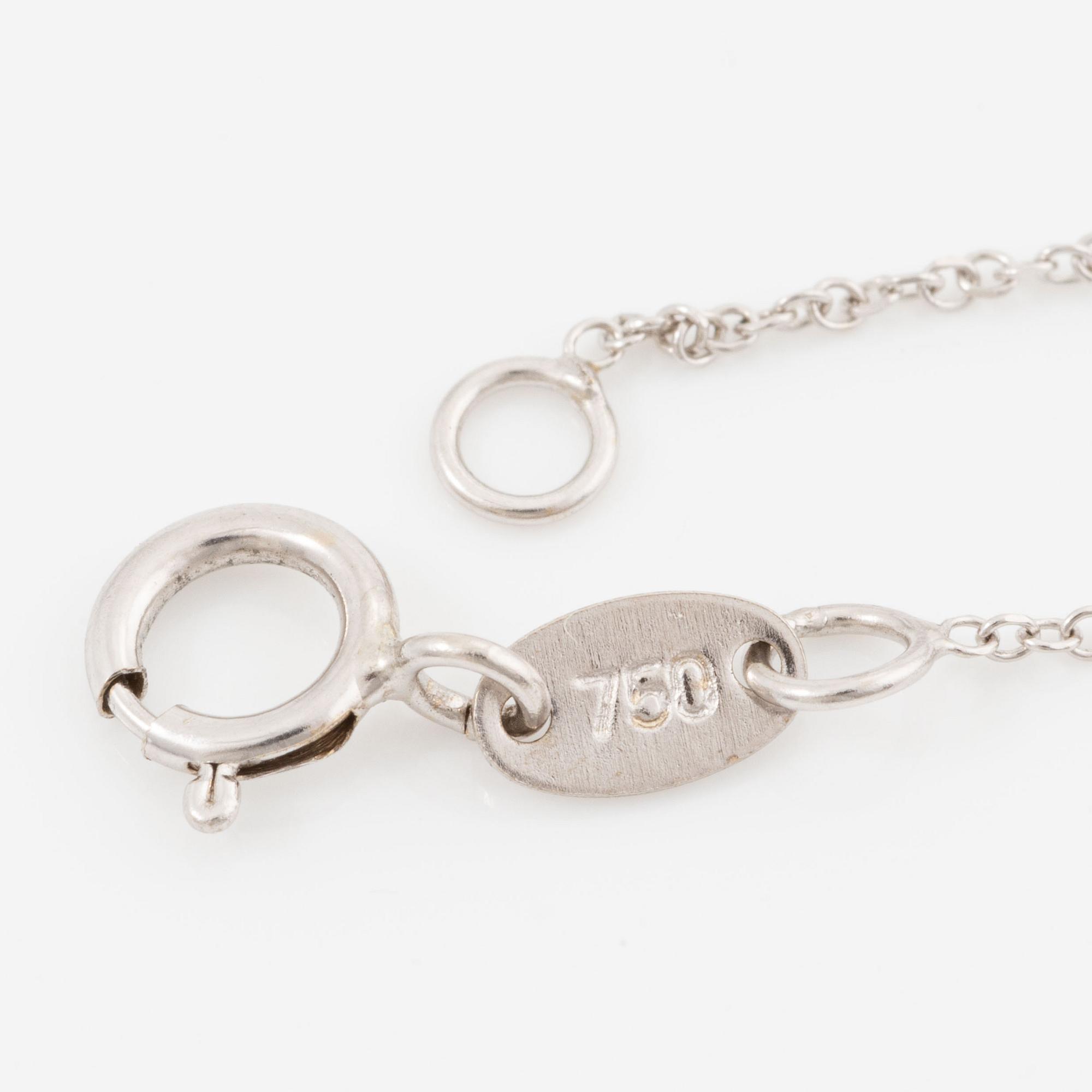 Necklace, 18K white gold with oval-cut aquamarine.
