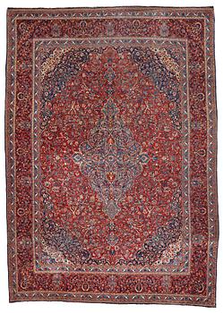 A CARPET, a semi-antique Kashan, ca 443,5 x 314,5 cm.