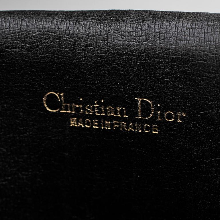 CHRISTIAN DIOR, a black monogram canvas bag and clutch bag.