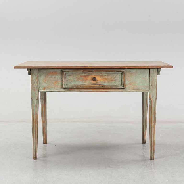 A 19th Century table with a drawer.