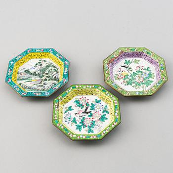 A set of 23 enamel on copper dishes, China, early 20th Century.