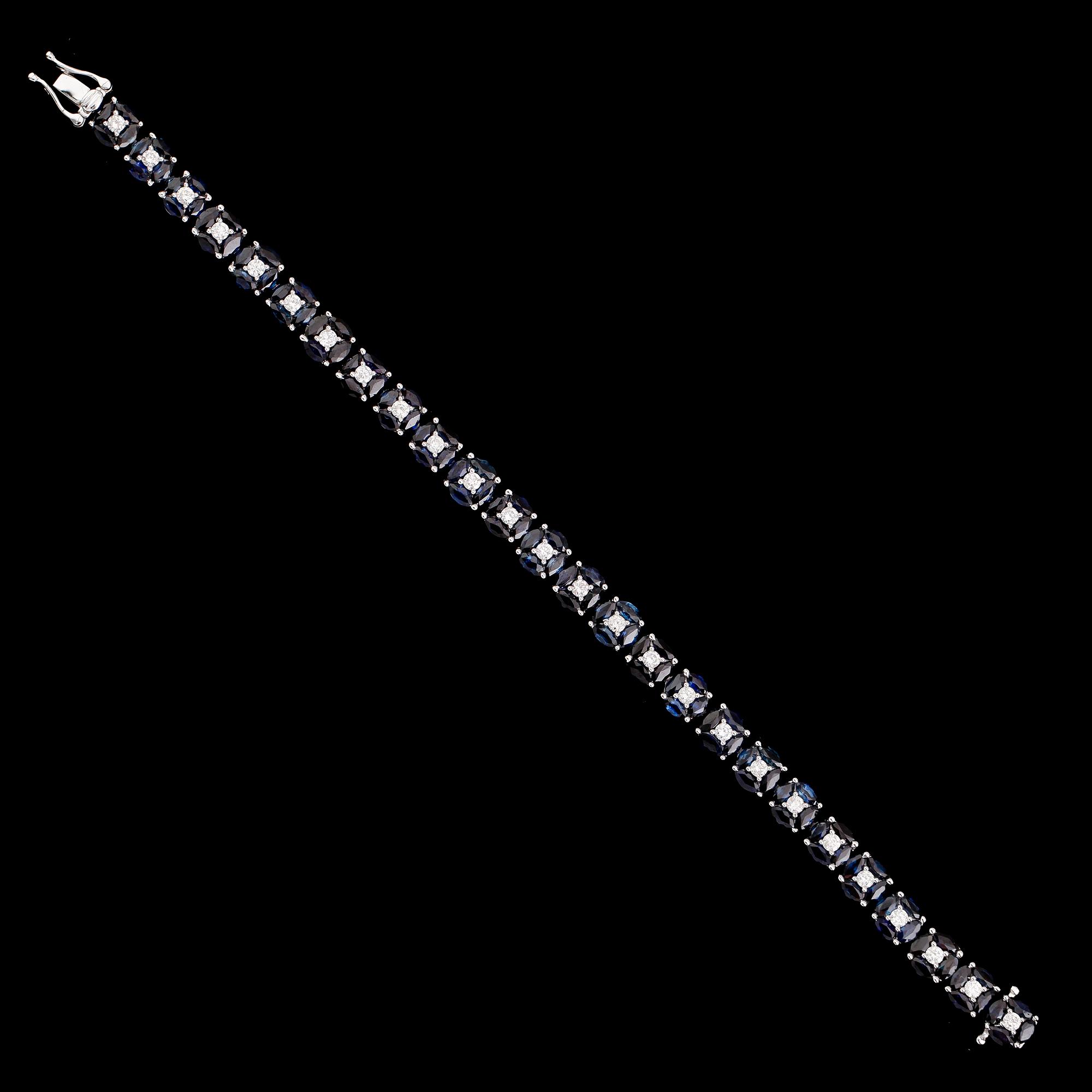 ARMBAND, 18 k vitguld, briljantslipade diamanter tot ca 1.21 ct, navettslipade safirer tot ca 11.16 ct.