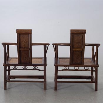 A pair of Chinese later part of the 20th century armchairs.