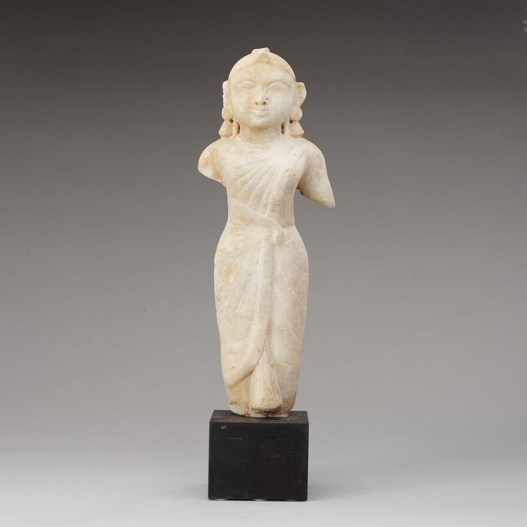 A Marble figure of a standing male figure, presumably Gujrat or Rajasthan, 17/18th Century.