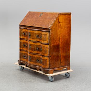 A late baroque secretaire chest of drawers, 18th century, northen Germany.