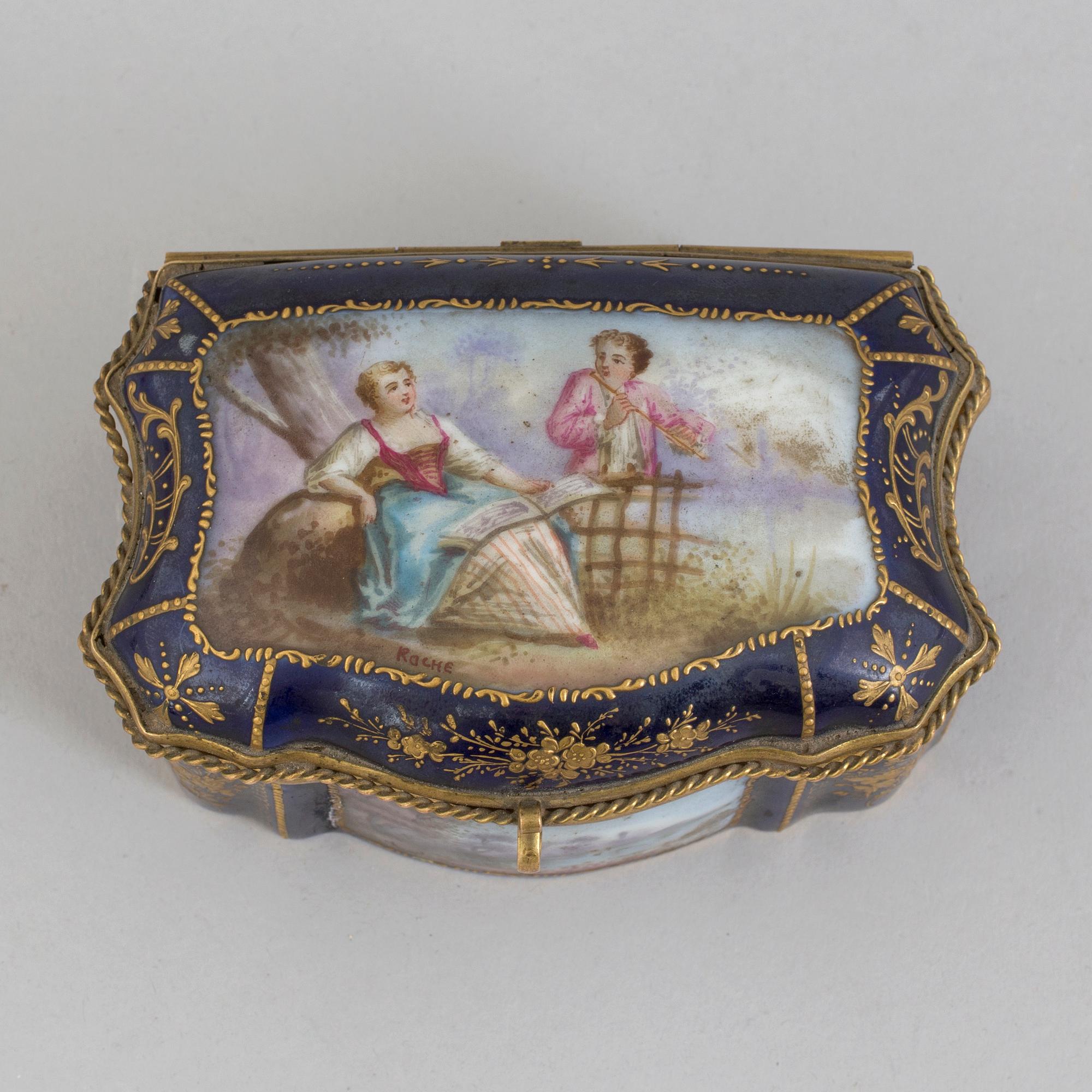 A circa 1900 porcelain box, Meissen style mark.