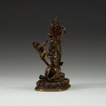 A Mongolian bronze figure of a Dharmapala, early 19th century.