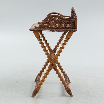 A Baroque-style serving table, circa 1900.