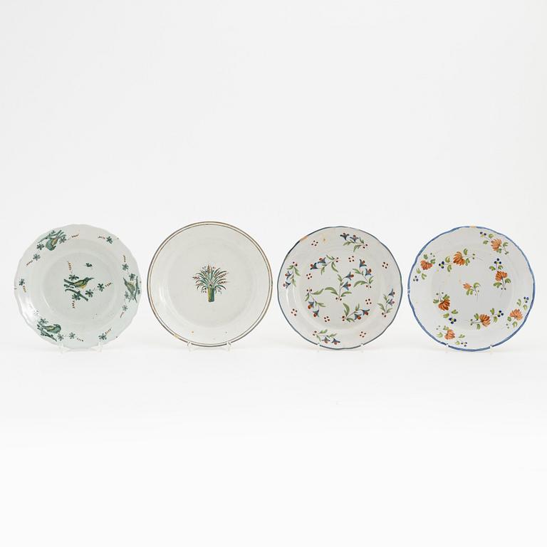 16 earthenware plates and two dishes, mostly french, 18th century.