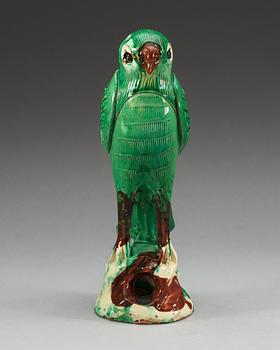 A green glazed falcon, Qing dynasty.