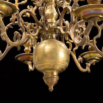 A brass chandelier, 18th century.