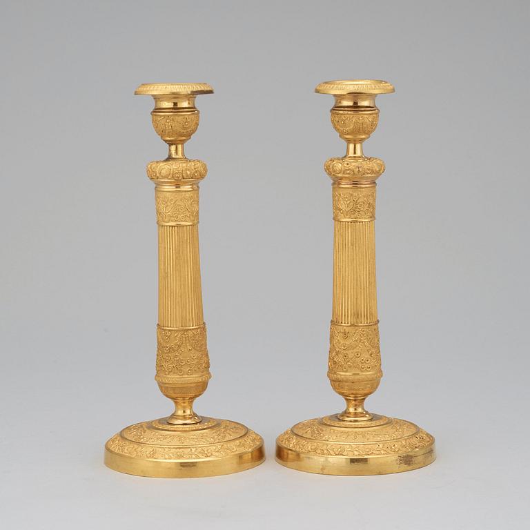 A pair of Empire candlesticks.