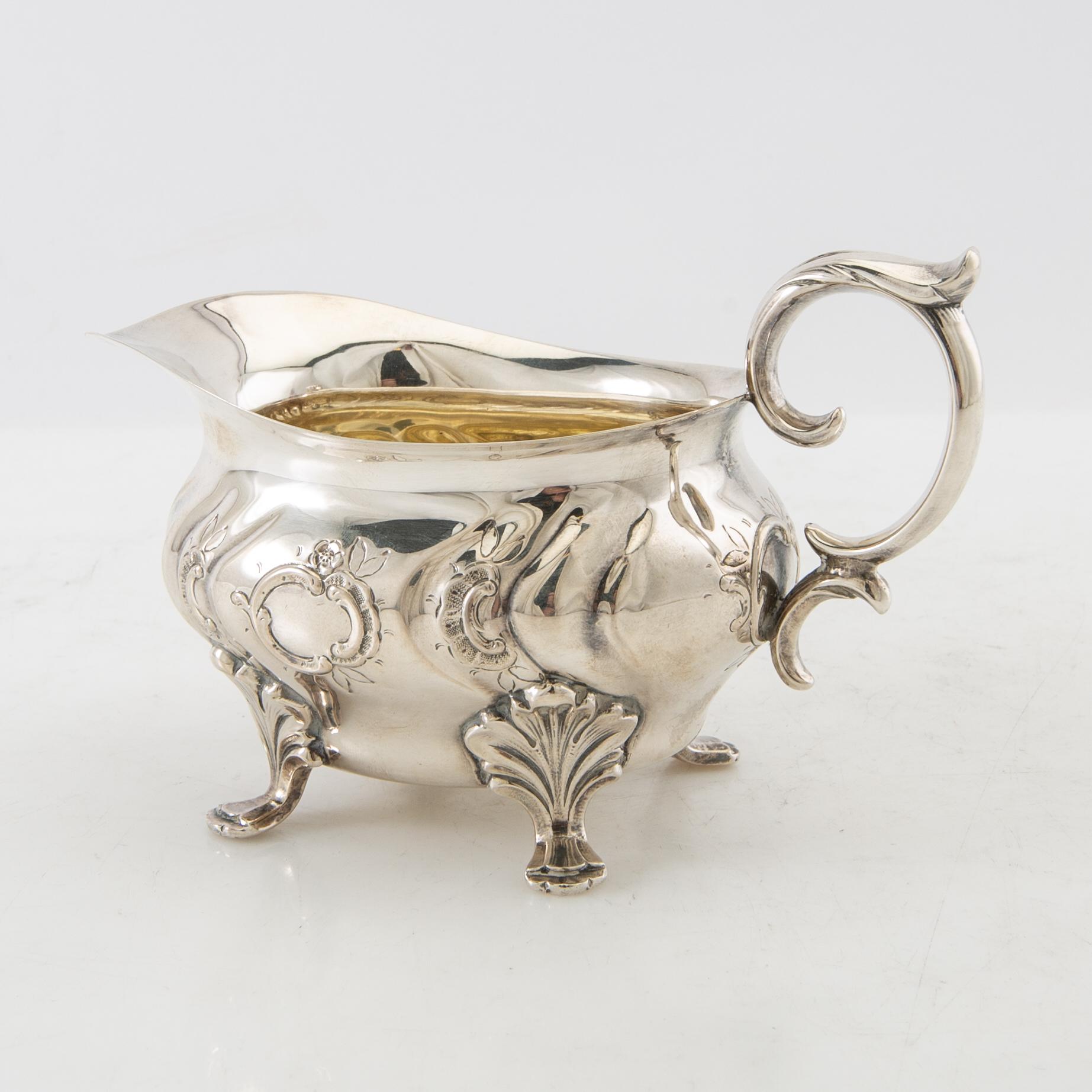 Cream jug Rococo style CG Hallberg Stockholm 1951 silver.