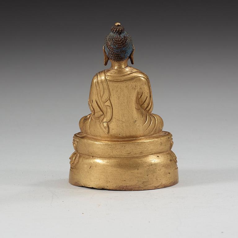 A gilt bronze Sakyamuni Buddha, Tibet, late 19th century.