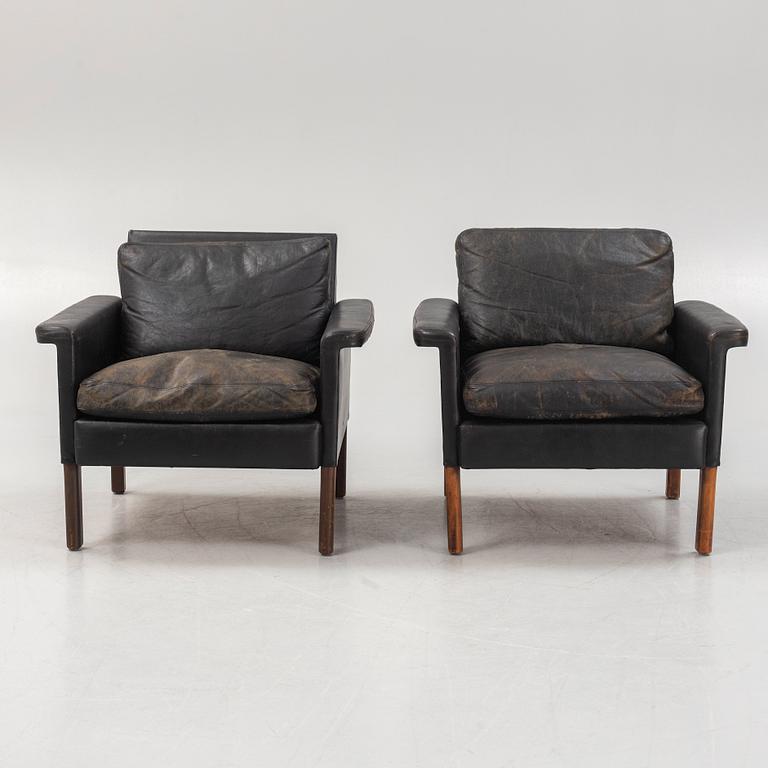 A pair of leather armchairs, Mio, Sweden, 1960's.