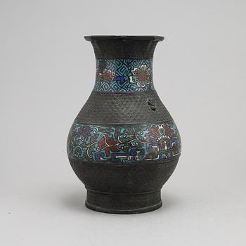 A Chinese bronze and cloisonné vase, around the year 1900.