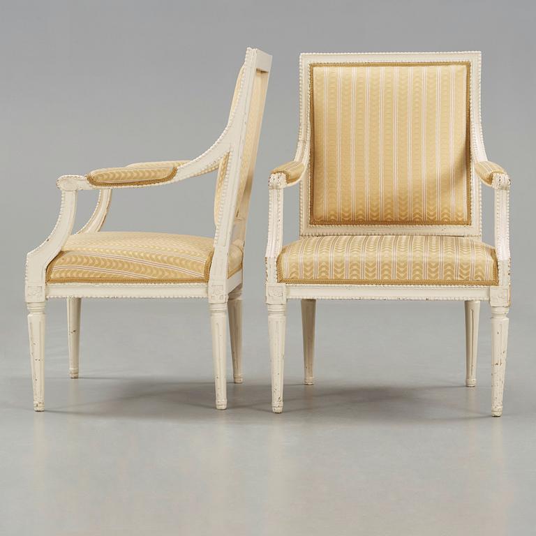 A pair of Gustavian late 18th century armchairs in the manner of Johan Lindgren.