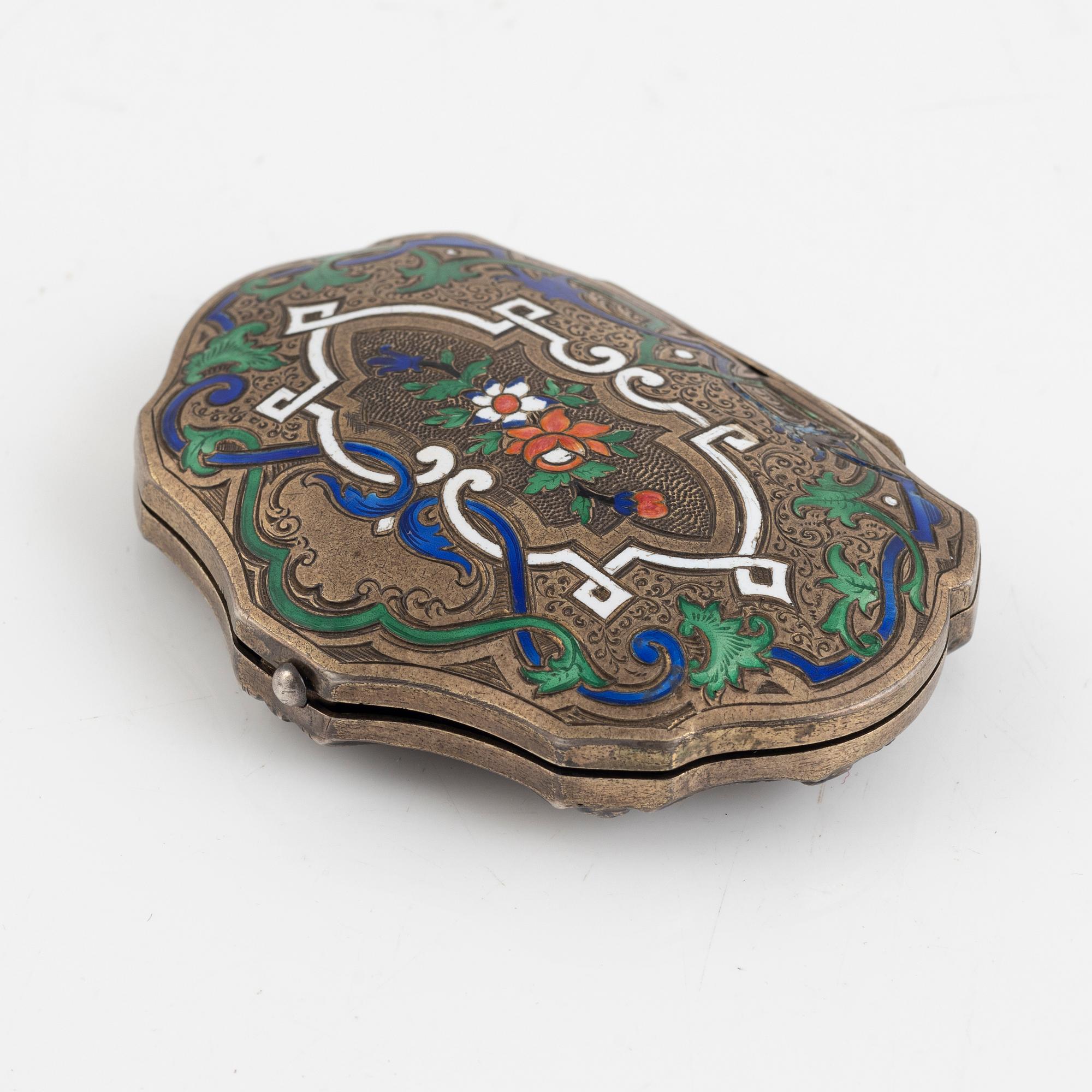A silver and enamel box, circa 1900.