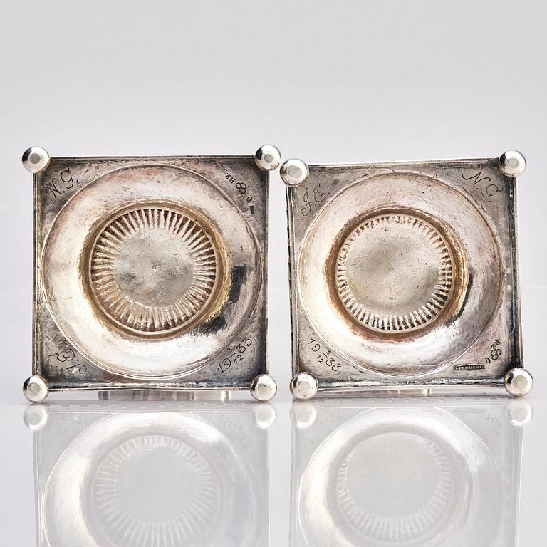 A pair of Swedish 18th century Gustavian silver candlesticks, marks of Arvid Floberg, Stockholm 1799.