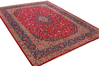 A Keshan carpet, c. 408 x 295 cm.