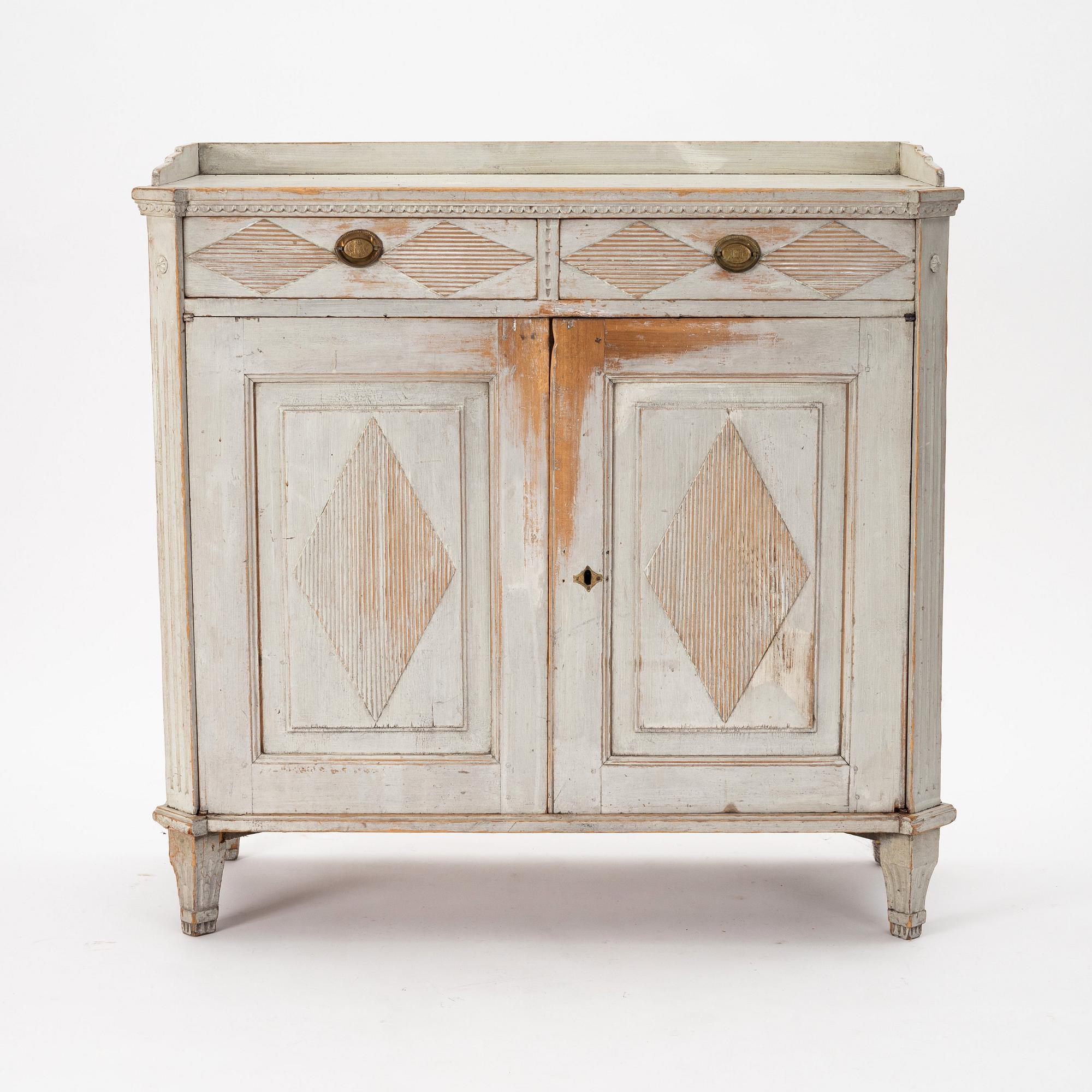 A late Gustavian grey lacquered pine cabinet, Sweden ca 1800.