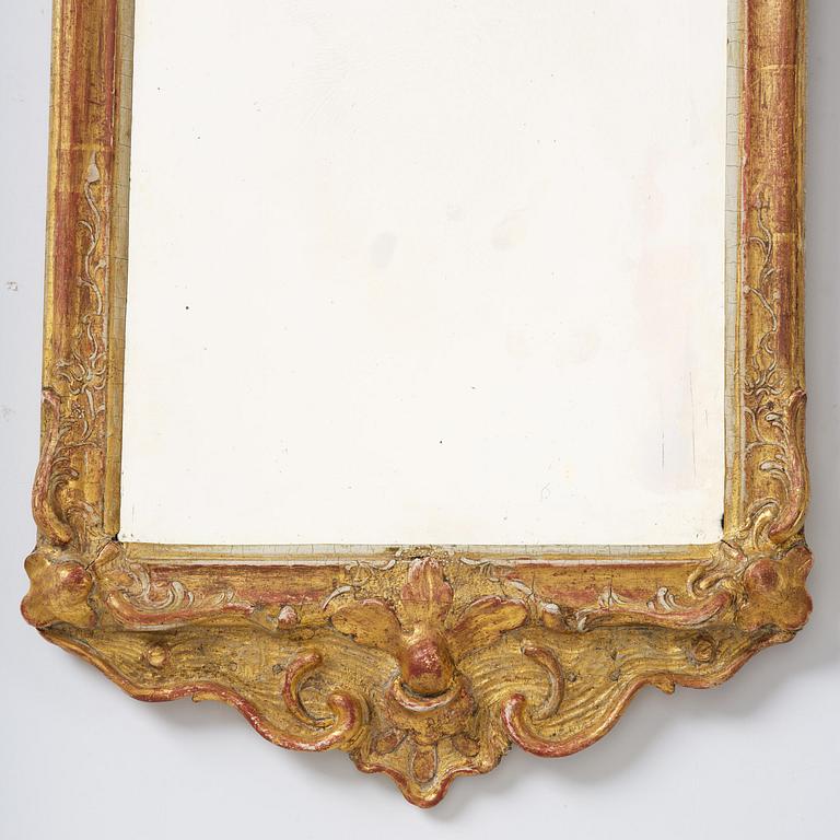 A rococo giltwood mirror attributed to E. Göbel (master in Stockholm 1744-64).