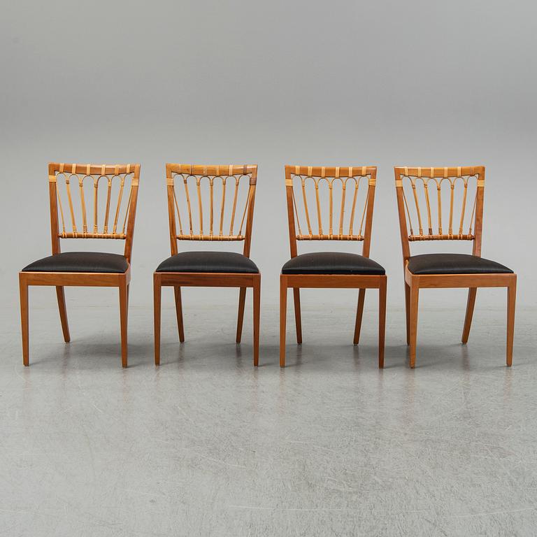 A set of four mahogany and rattan dining chairs, Josef Frank, , model 1165, Svenskt Tenn, Stockholm.