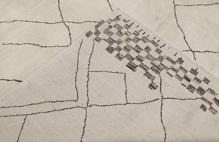 A Moroccan carpet, approx. 303 x 202 cm.