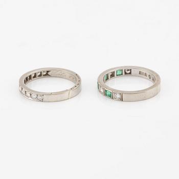 Rings, 2 pcs, alliance rings, 18K white gold with diamonds, one of them with diamonds and emeralds.