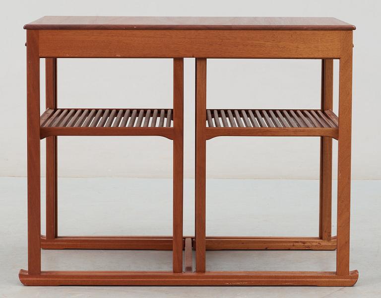 A Carl Malmsten teak set of occasional tables, manufactured by Åfors Möbelfabriks AB, Sweden.