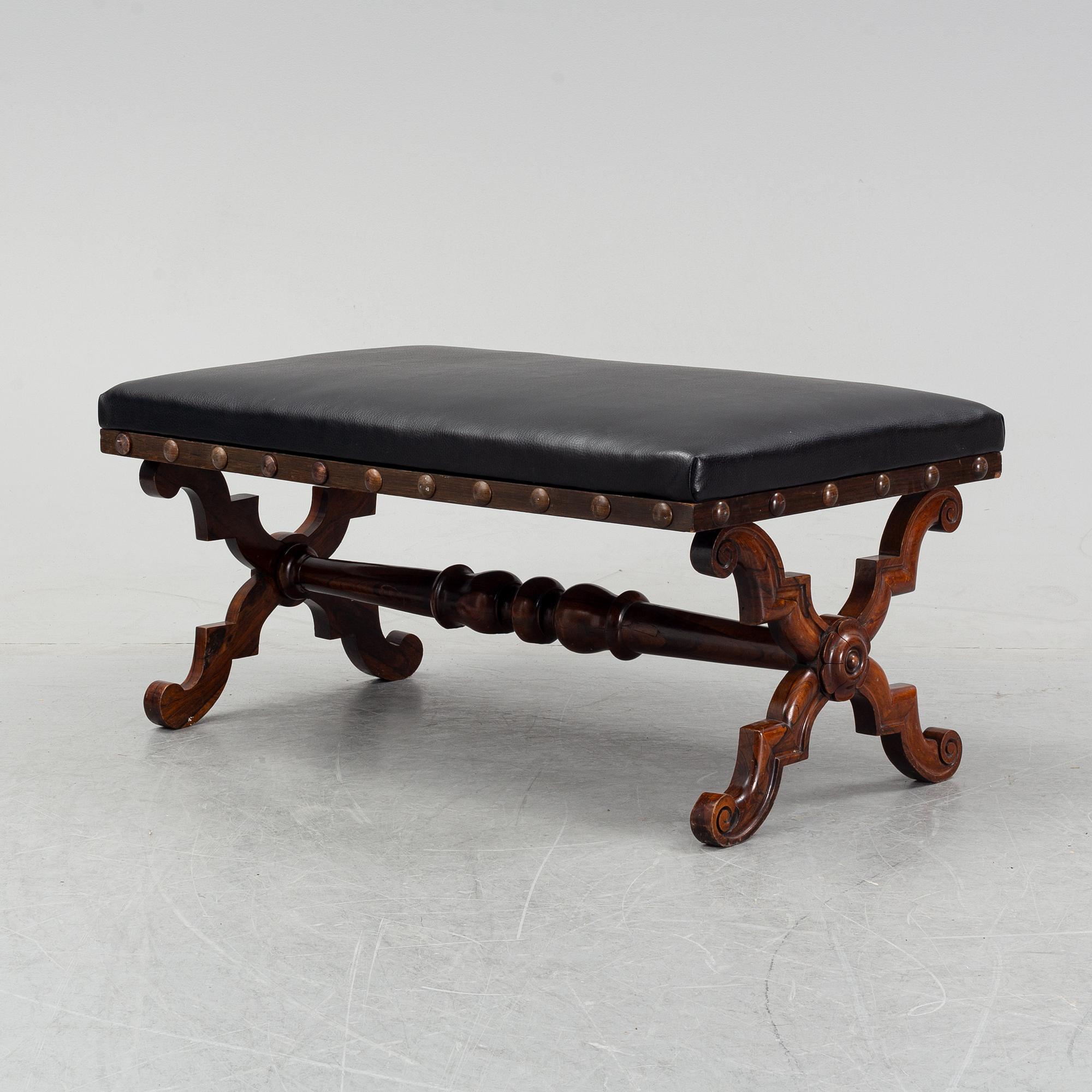 A rosewood bench, late 19th Century.