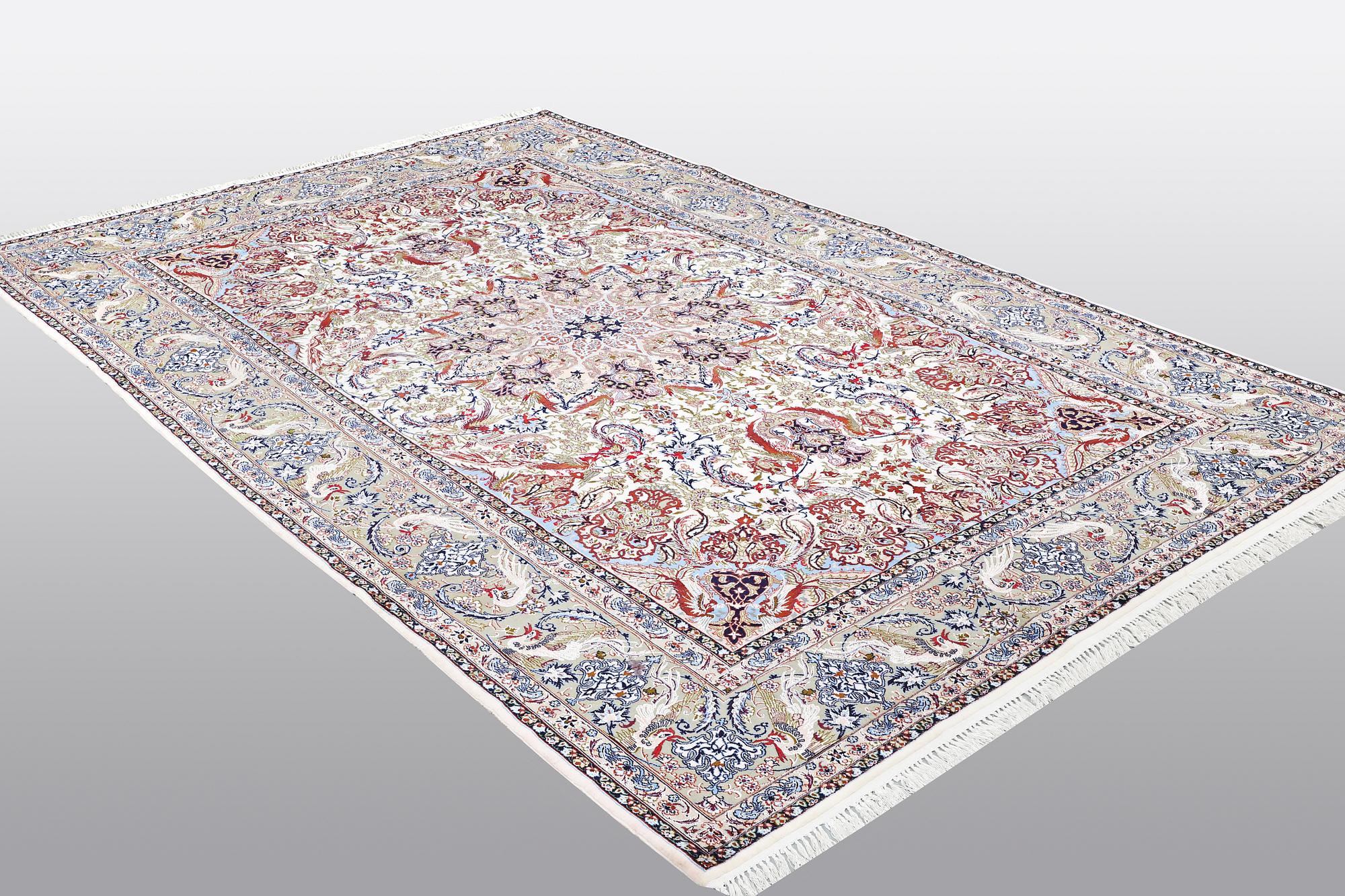 A carpet, Old Esfahan, part silk, ca 308 x 202 cm.